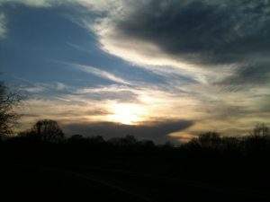 Photo of a cloudy sunset, photography by R. Isip