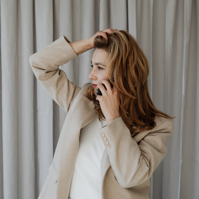 Image of a businesswoman talking on a cell phone