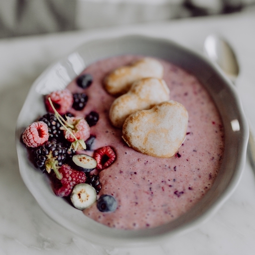 Breakfast bowl with yogurt fruit and biscuits