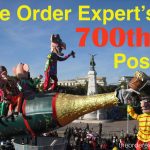 Image of a parade float of people on a champagne float and the phrase, The Order Expert's 700th Post!