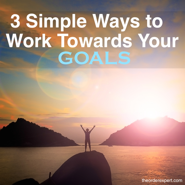 Image of a person standing on a peak at sunset and the phrase, 3 Simple Ways to Work Towards Your Goals