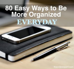 Image of a notebook, smartphone and pen and the phrase, 80 Easy Ways to Be More Organized Everyday