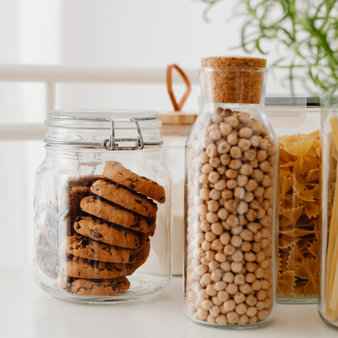 Cookies and chickpeas in storage jars