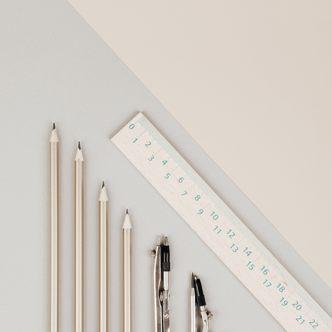 Office supplies on a pastel background