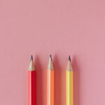 Closeup of three pencils in a vertical row